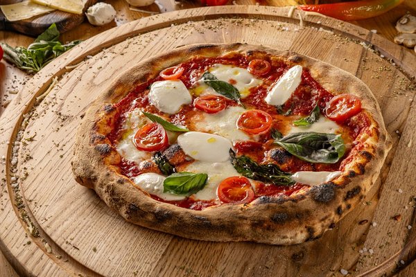 ¿Cuáles son las claves para una pizza napolitana con bordes aireados?